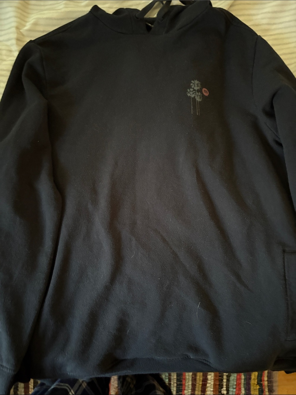Travis Mathew Black Crewneck Sweatshirt with Subtle Chest Motif